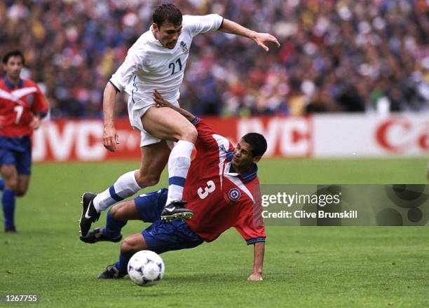 Chirstian Vieri of Italy skips past Ronald Fuentes of Chile during the World Cup group B game at the Stade Geoffroy Guichard in St Etienne, France. \...