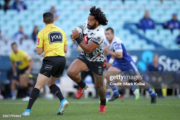 Adam Blair of the Warriors runs in to referee Peter Gough during the round 15 NRL match between the Canterbury Bulldogs and the New Zealand Warriors...