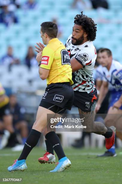 Adam Blair of the Warriors runs in to referee Peter Gough during the round 15 NRL match between the Canterbury Bulldogs and the New Zealand Warriors...