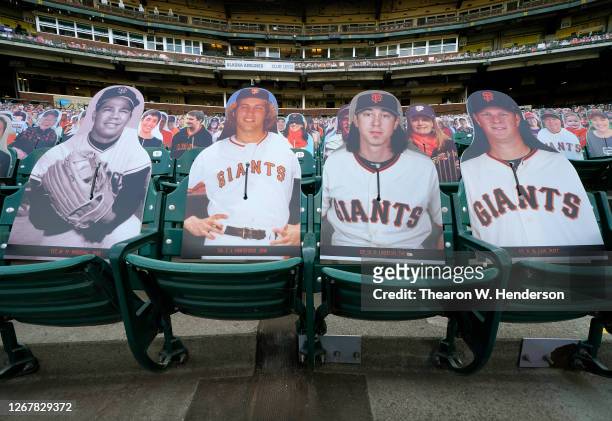 Detailed view of cardboard cutouts of former San Francisco Giants pitchers Juarn Marichal, John Montefusco, Tim Lincecum and Matt Cain sitting in...