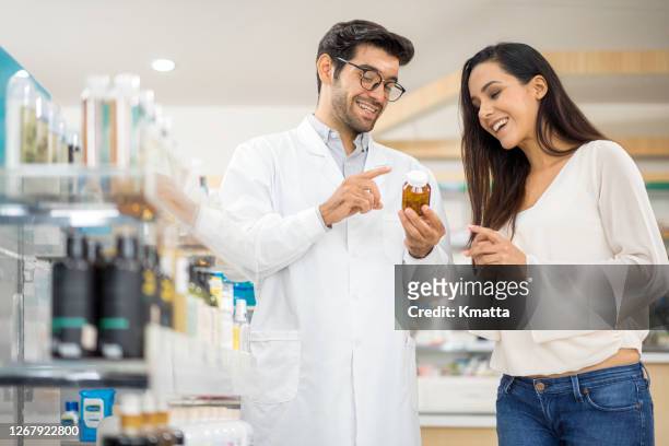 healthy worker service and assistance. - pharmacist and patient stock pictures, royalty-free photos & images