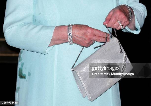 Queen Elizabeth II departs after attending King Constantine II of Greece's 70th birthday party at Crown Prince Pavlos of Greece's residence on June...