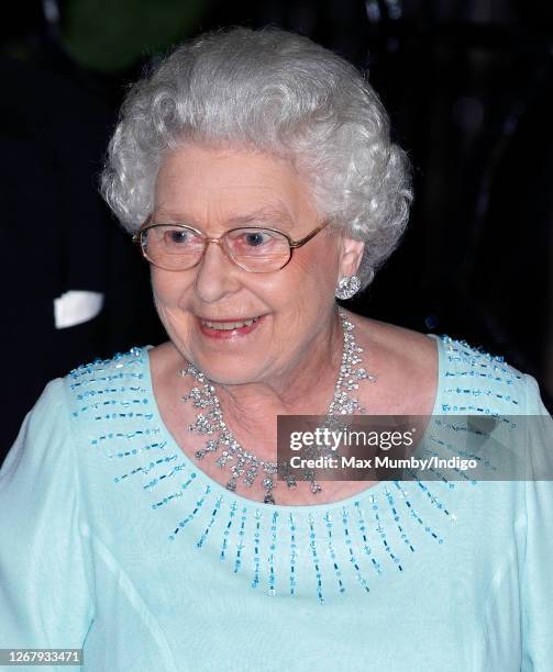 Queen Elizabeth II departs after attending King Constantine II of Greece's 70th birthday party at Crown Prince Pavlos of Greece's residence on June...