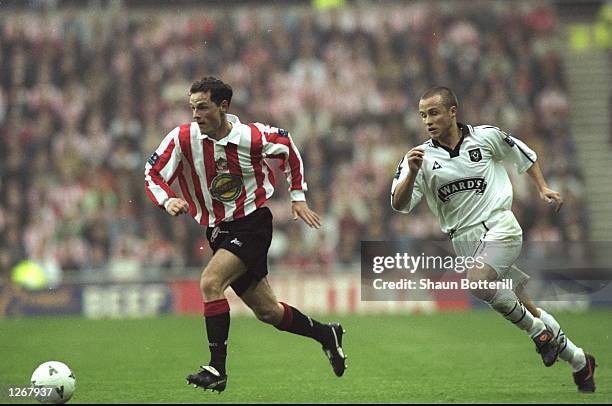 Allan Johnston of Sunderland gets away from Paul Devlin of Sheffield United during the Nationwide League Divison One play-off at the Stadium of Light...