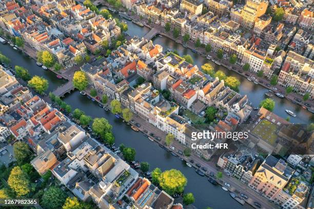 amsterdam centrum channels with homes - netherlands aerial stock pictures, royalty-free photos & images