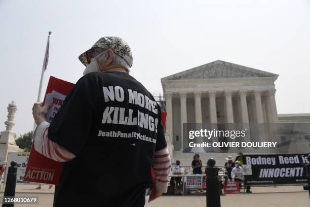 Death penalty protesters demonstrate outside the US Supreme Court in Washington, DC, on June 29, 2023.