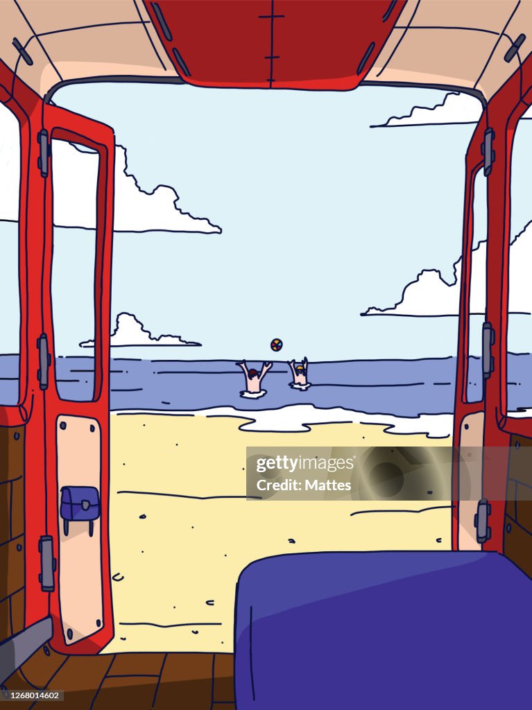 Outside view of the beach with friends playing with a beach volleyball in the ocean viewed from the inside of a van, camping car.