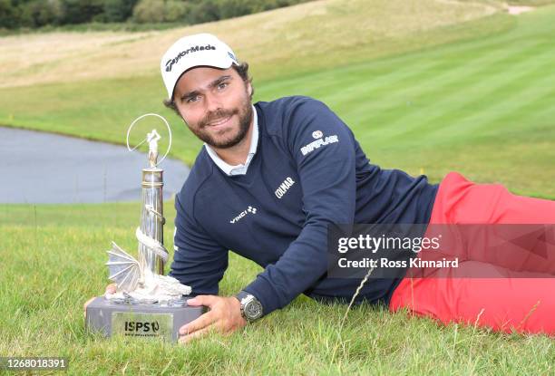 Romain Langasque of France poses with the trophy after winning the Wales Open at the Celtic Manor Resort on August 23, 2020 in Newport, Wales.