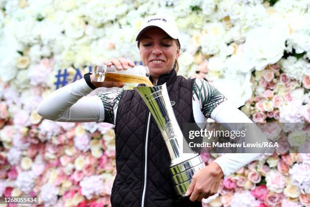 Sophia Popov of Germany pours a drink into the trophy following victory in the final round on Day Four of the 2020 AIG Women's Open at Royal Troon on...