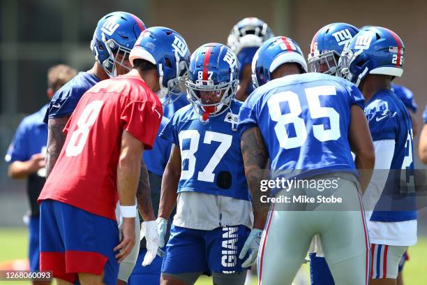 Daniel Jones and Sterling Shepard of the New York Giants run drills at NY Giants Quest Diagnostics Training Center on August 23, 2020 in East...