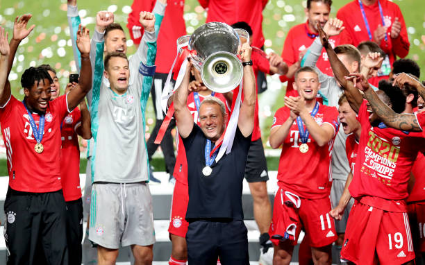 Head coach Hansi Flick of Bayern Muenchen celebrates the victory with the trophy during the UEFA Champions League Final match between Paris...