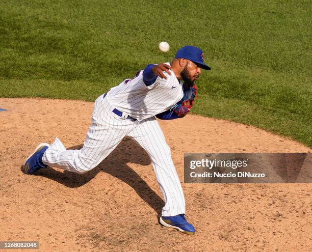 Jeremy Jeffress of the Chicago Cubs throws a pitch during the ninth inning of a game against the Chicago White Sox at Wrigley Field on August 23,...