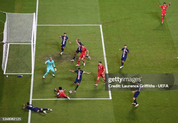 Kingsley Coman of FC Bayern Munich is brought down by Thilo Kehrer of Paris Saint-Germain, in an incident that was then taken to VAR, but no penalty...