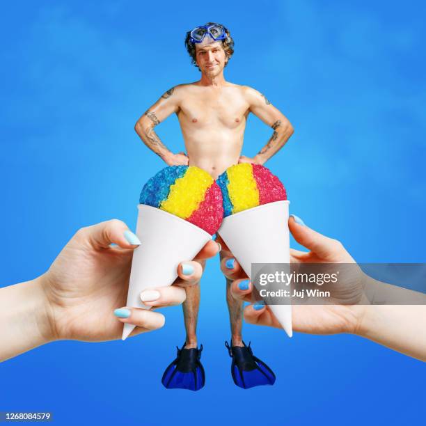 man in snorkle gear with shaved ice - snow cones shaved ice stock pictures, royalty-free photos & images