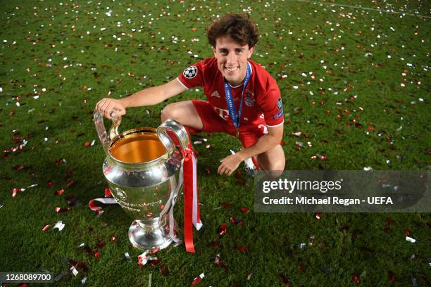 Alvaro Odriozola of FC Bayern Munich celebrates with the UEFA Champions League Trophy following his team's victory in the UEFA Champions League Final...