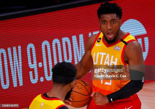 Donovan Mitchell of the Utah Jazz celebrates a win against the Denver Nuggets following Game Four of the Western Conference First Round during the...