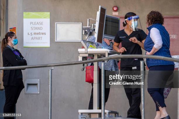 Nurse is seen working at a Covid-19 testing clinic at Ipswich Hospital on August 24, 2020 in Brisbane, Australia. A cluster of COVID-19 cases linked...