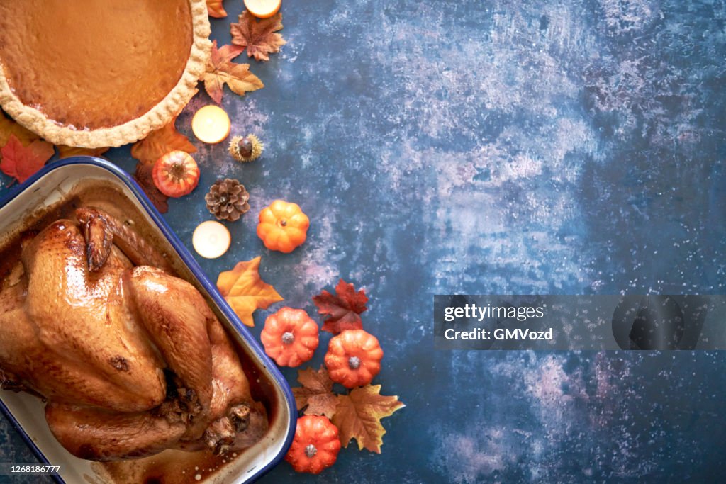 Traditional Holiday Stuffed Turkey on Rustic Background