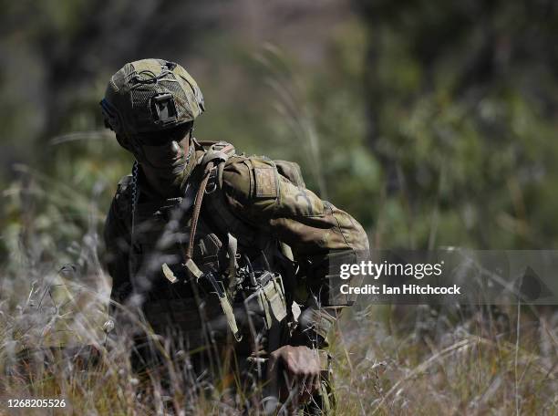 Soldier from 1 RAR participates in a platoon live fire attack on August 24, 2020 in Townsville, Australia. Exercise Brolga Run is an annual training...