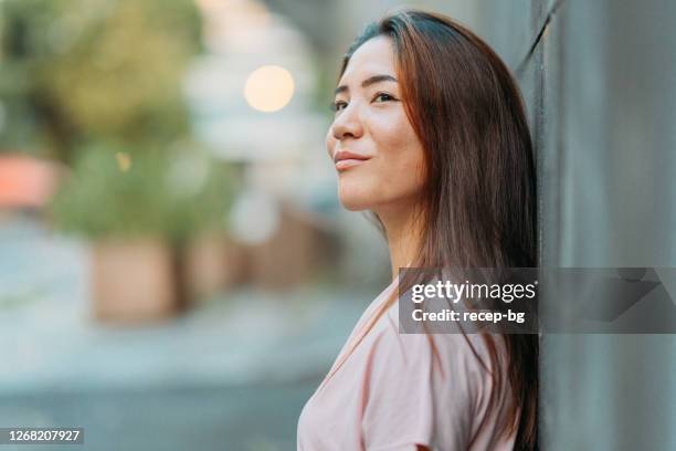 portrait of young confident businesswoman - smirking stock pictures, royalty-free photos & images