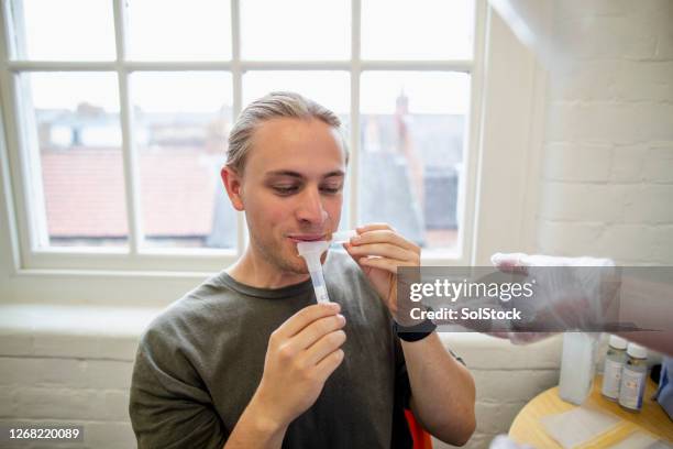 recolectar saliva - spit fotografías e imágenes de stock