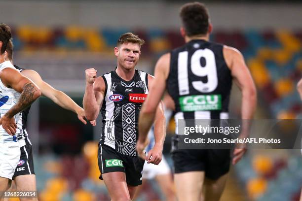 Flynn Appleby of the Magpies celebrates a goal during the round 13 AFL match between the Collingwood Magpies and the North Melbourne Kangaroos at The...