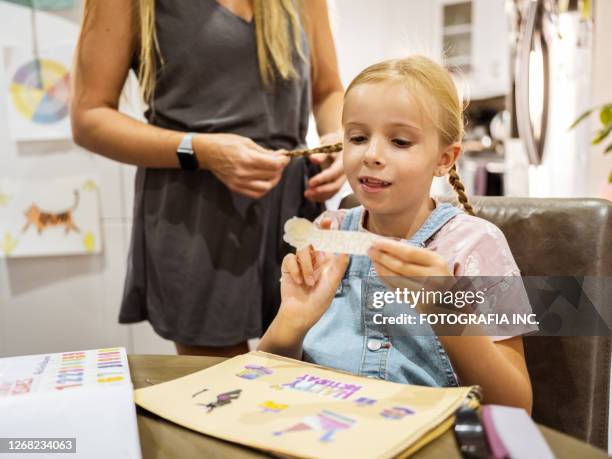 mother and daughter getting ready - girl power stickers stock pictures, royalty-free photos & images