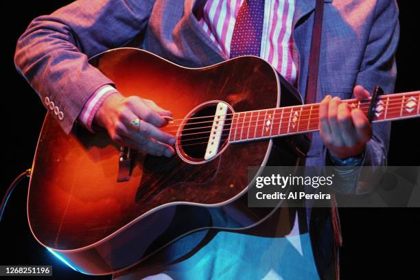 Detail of his hands on the guitar when Justin Townes Earle headlines when he performs as part of the Celebrate Brooklyn! summer concert series at the...