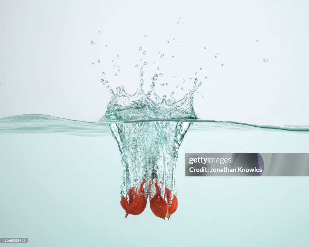 Guarana fruit falling into water