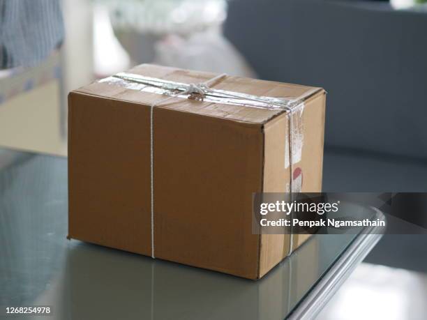 paper box on the table homemade care packages - care package stock pictures, royalty-free photos & images