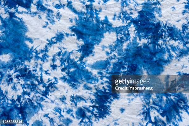colorful dyed cloth - tie dye stock pictures, royalty-free photos & images
