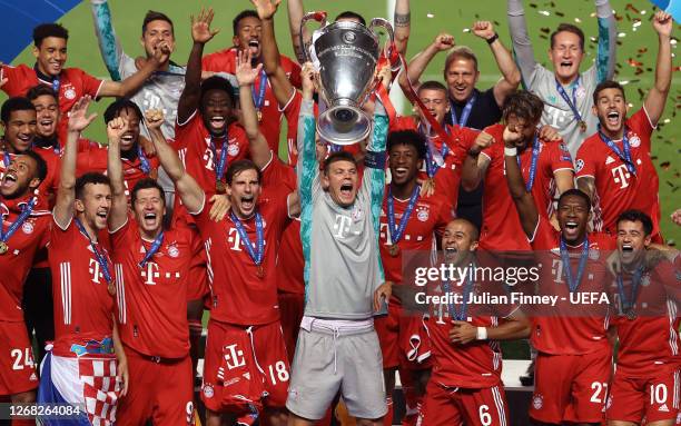 Manuel Neuer, captain of FC Bayern Munich lifts the UEFA Champions League Trophy following his team's victory in the UEFA Champions League Final...