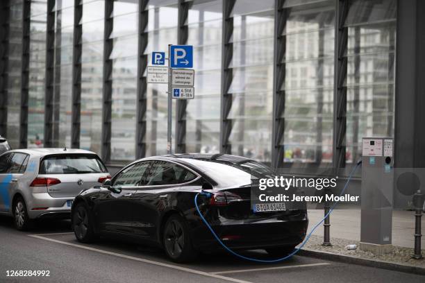 Tesla electro car is seen on August 24, 2020 in Berlin, Germany. Germany is carefully lifting lockdown measures nationwide in an attempt to raise...