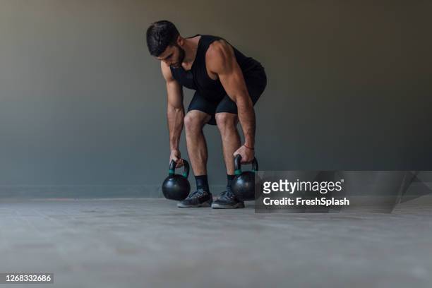 man exercising with kettlebells, cross training concept - deadlift stock pictures, royalty-free photos & images
