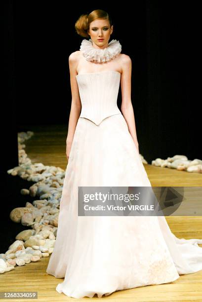 Model walks the runway during the Georges Chakra Haute Couture Spring/Summer 2003 fashion show as part of the Paris Haute Couture Fashion Week on...