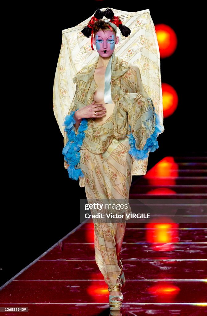 Models 2003 Eugenia Volodina walks the runway during the Dior Haute Couture... News ...
