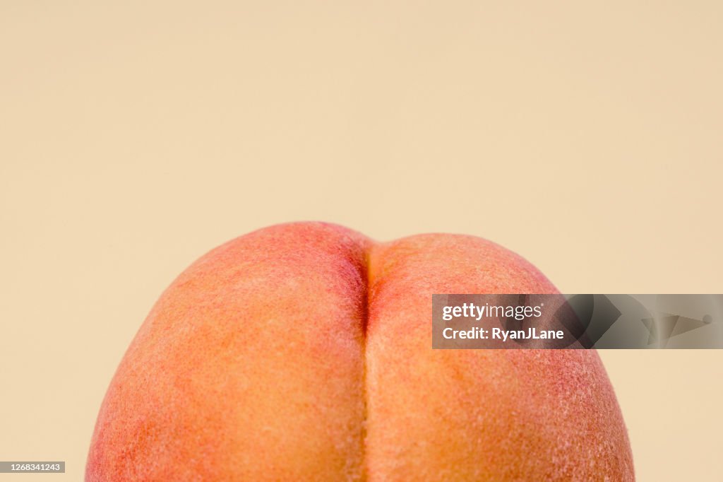 Fresh Peach on Peach Colored Background