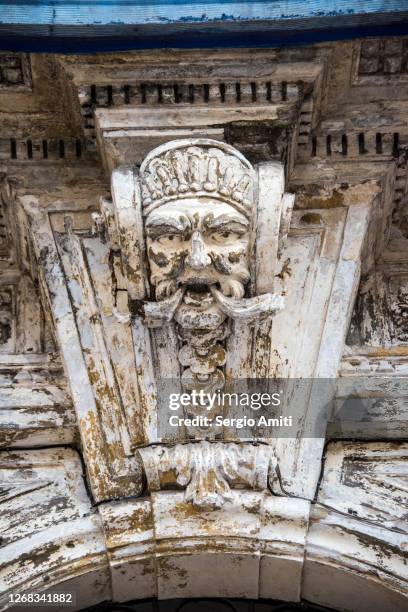 decorative arab-norman keystone above a door in palermo - keystone stock pictures, royalty-free photos & images