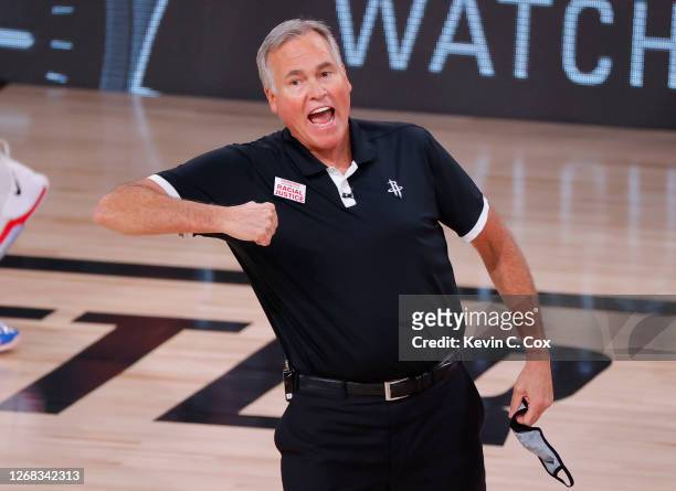 Mike D'Antoni of the Houston Rockets reacts during the third quarter against the Oklahoma City Thunder in Game Four of the Western Conference First...