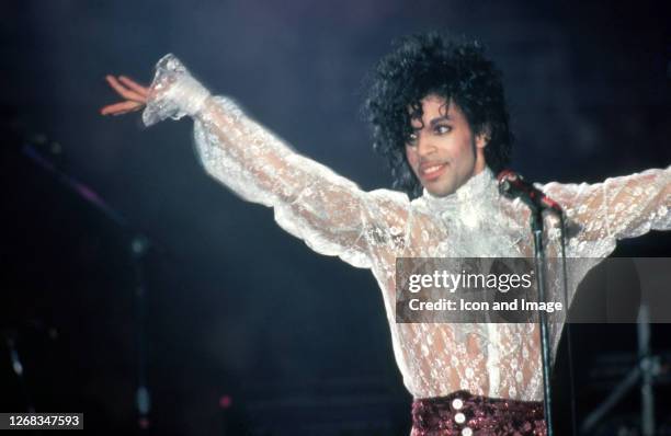 American singer, songwriter, musician, record producer, dancer, actor, and filmmaker Prince performs onstage during the 1984 Purple Rain Tour on...