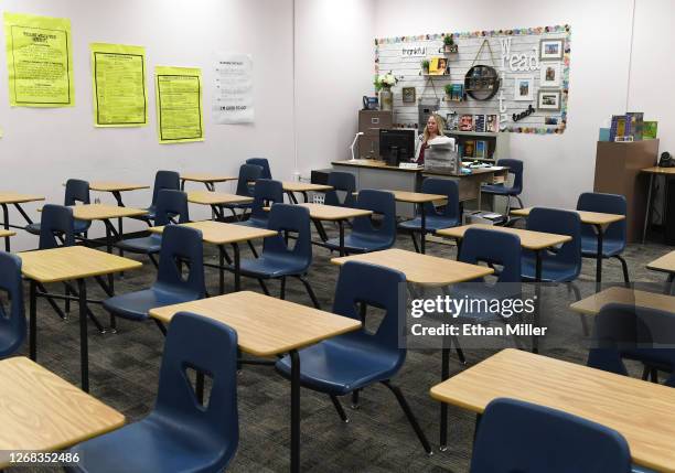 Kellie Goodall teaches an online eighth grade English class from her empty classroom at Walter Johnson Junior High School on the first day of...