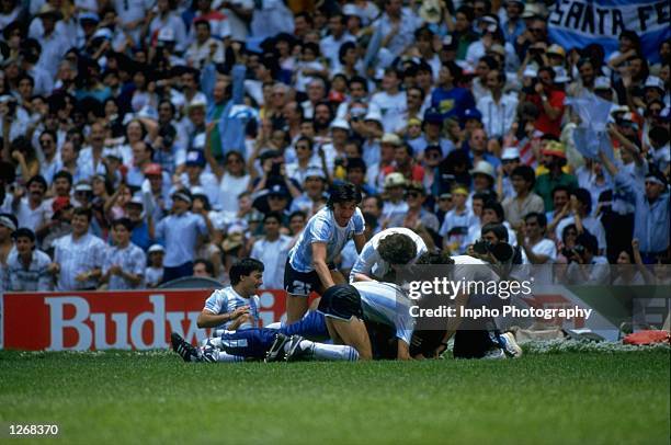 The Argentinian team celebrate after Burruchaga scores a goal during the World Cup Final match against West Germany at the Azteca Stadium in Mexico...