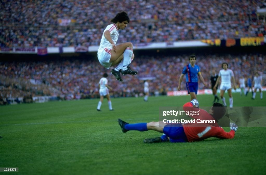 Marius Lacatus of Steaua Bucuresti and Urruti of Barcelona in action during the European Cup