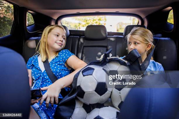 soccer girls driving to football training - drive ball sports stock pictures, royalty-free photos & images