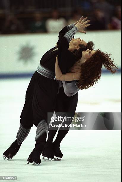 Sergei Ponomarenko and Marina Klimova both of the Eastern Unified Nations in action during the Ice Dancing event at the 1992 Winter Olympic Games in...