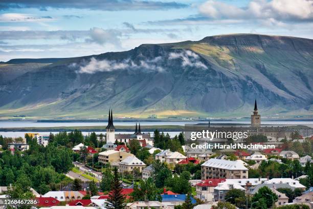 elevated view across reykjavik, capital region, iceland - reykjavik stock-fotos und bilder