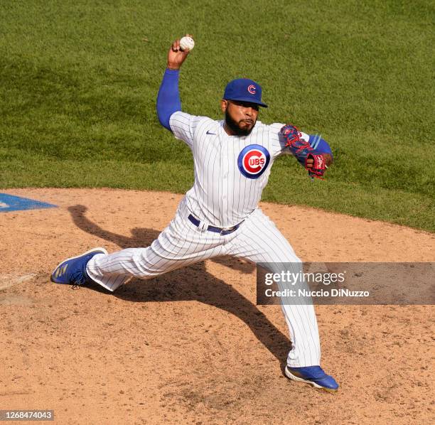 Jeremy Jeffress of the Chicago Cubs throws a pitch during the ninth inning of a game against the Chicago White Sox at Wrigley Field on August 23,...