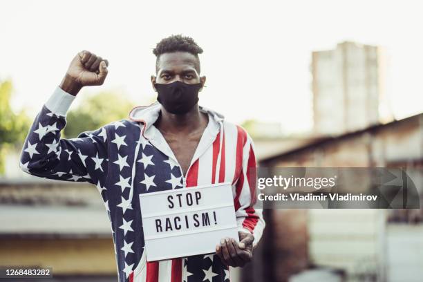 Fight Racism Image 9,552 We Stand Against Racism Stock Photos, High-Res Pictures, and ...