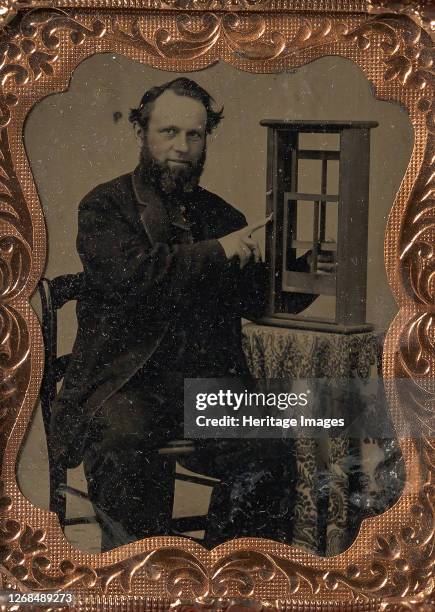 Seated Man Demonstrating Vertical Sliding Window Model, late 1850s-60s. Artist Unknown.