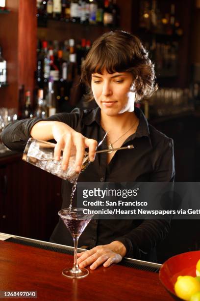 Jackie Patterson making her cocktail drink she created called "The Violet Hour" at Zinnia restaurant in San Francisco, Calif., on November 14, 2008.